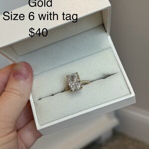 Elegant Gold Ring with Clear Stone